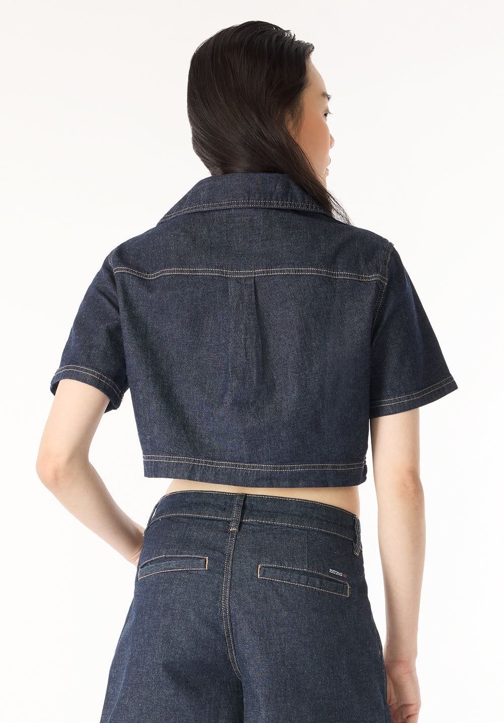 Lincoln Paris Elan Denim Co-ord set featuring a matching denim jacket and pants on a hanger.