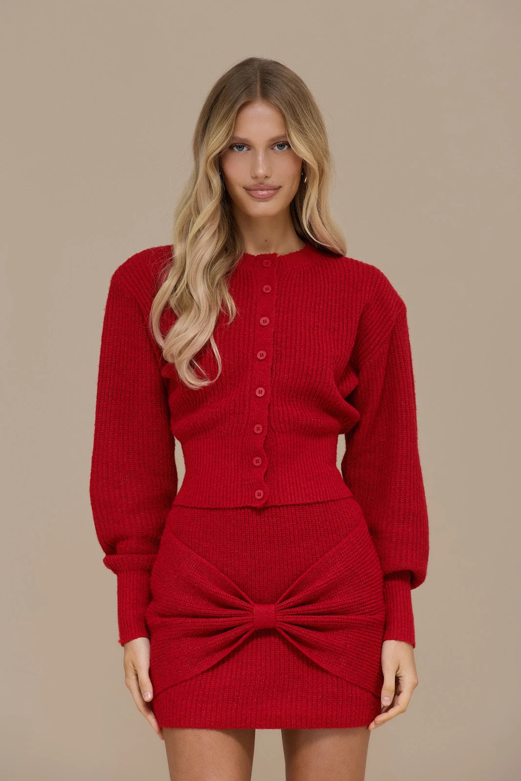 Crimson Doll Set by Lincoln Paris featuring elegant red dolls with detailed clothing and accessories.