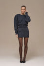 Elegant Lincoln Paris Winter Noir Set featuring stylish black accessories and clothing for a chic winter look.