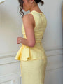 Lincoln Paris Buttercup Co-ord set featuring a stylish matching top and pants in a bright, floral pattern.