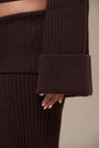 Lincoln Paris Winter Affair Set featuring cozy, stylish winter accessories including scarves and gloves arranged on a neutral background.
