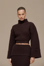 Lincoln Paris Winter Affair Set featuring cozy matching sweaters and scarves in warm winter tones.