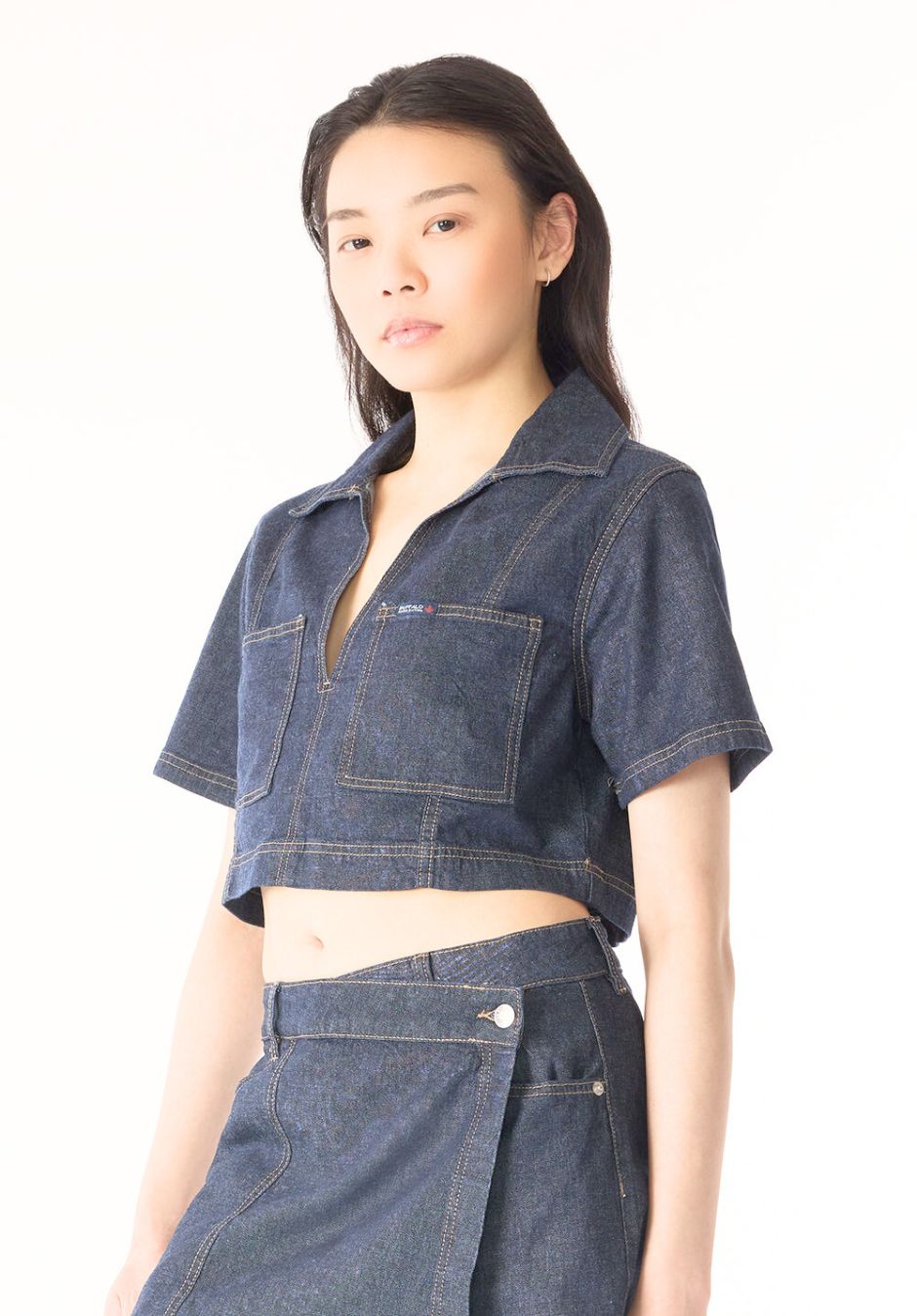 Lincoln Paris Elan Denim Co-ord set featuring a fitted denim jacket and matching high-waisted jeans, styled on a model.