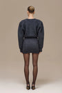 Lincoln Paris Winter Noir Set featuring a stylish, dark-colored winter clothing ensemble with a coat and accessories.