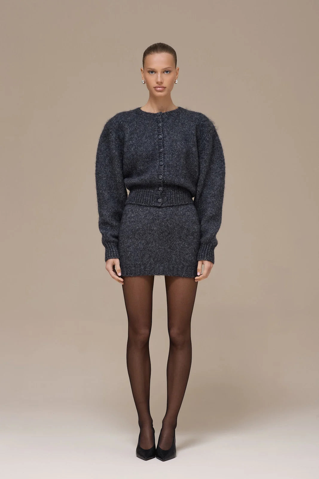 Lincoln Paris Winter Noir Set featuring stylish black winter apparel with a modern, sleek design and cozy fabric.