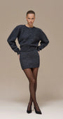 Lincoln Paris Winter Noir Set featuring a stylish black winter coat and matching accessories, displayed on a neutral background.