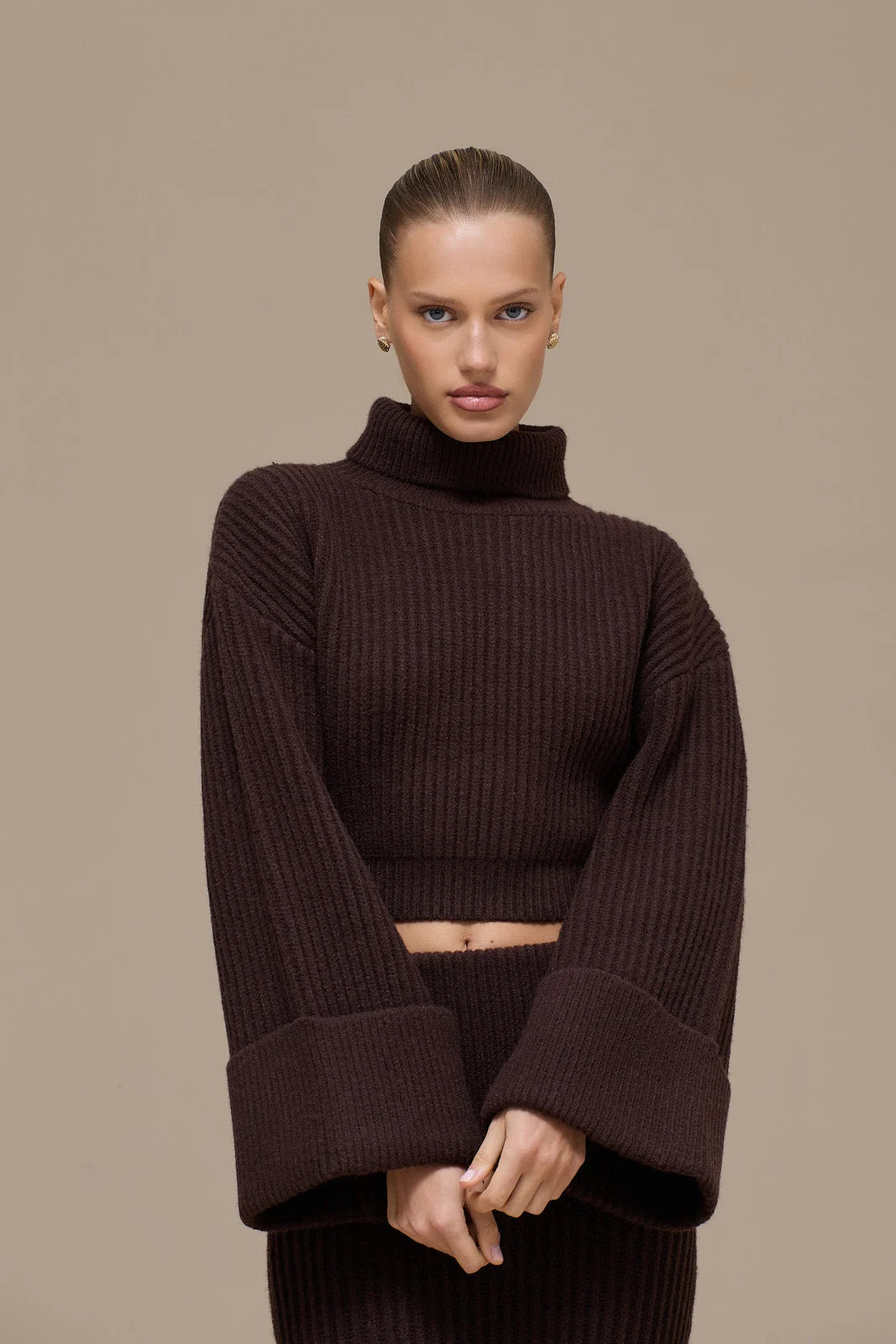 Lincoln Paris Winter Affair Set featuring cozy knit sweater and scarf in neutral tones on a mannequin.