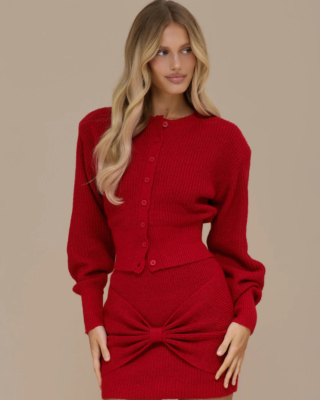 Crimson doll set by Lincoln Paris featuring multiple dolls with red outfits and detailed accessories.