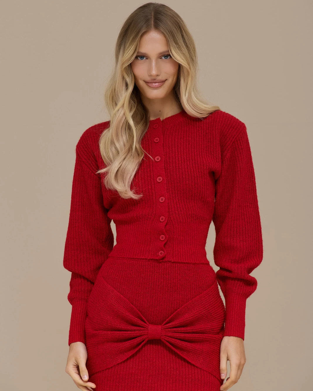 Crimson Doll Set by Lincoln Paris featuring stylish dolls with red outfits and detailed accessories on a white background.