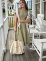 Sage linen dress by Lincoln Paris featuring a relaxed fit, sleeveless design, and natural fabric for a casual, elegant look.