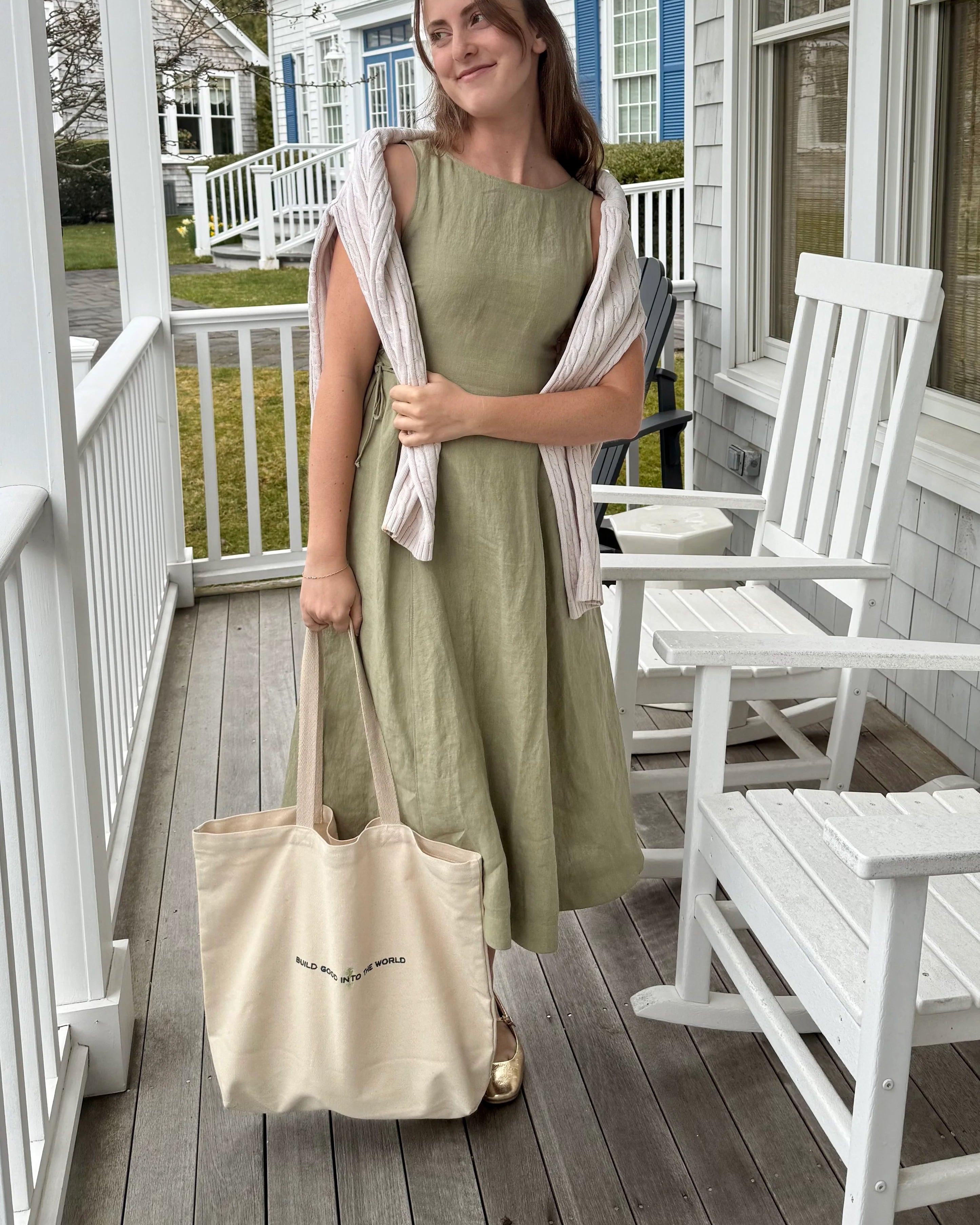 Sage linen dress by Lincoln Paris featuring a relaxed fit, sleeveless design, and natural fabric for a casual, elegant look.