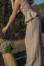 Lincoln Paris Linen Ease Pants in soft beige, featuring relaxed fit, elastic waistband, and lightweight linen fabric.