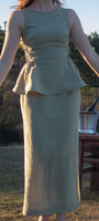 Lincoln Paris Linen Muse skirt in beige, featuring a flowy design and elastic waistband, displayed on a hanger.