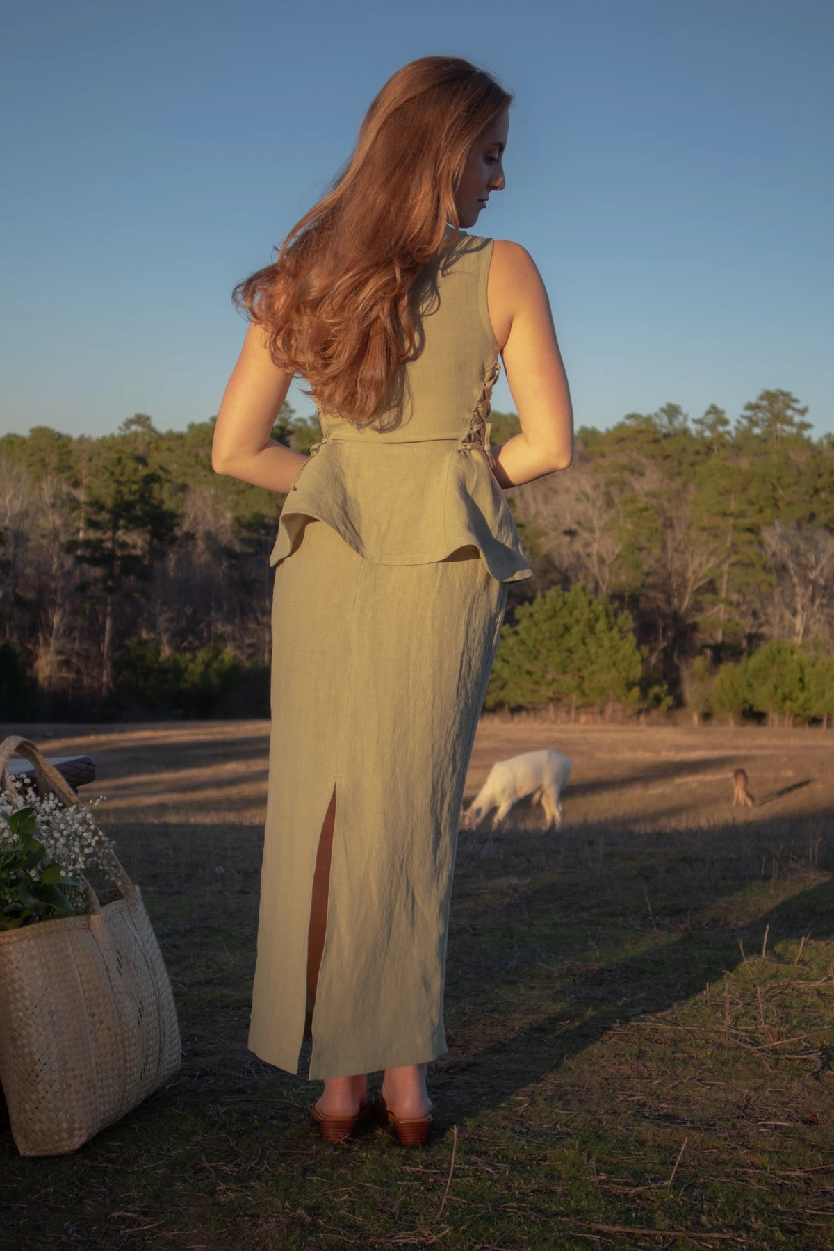 Lincoln Paris Linen Muse skirt in natural linen fabric, featuring a flowing design and midi length.
