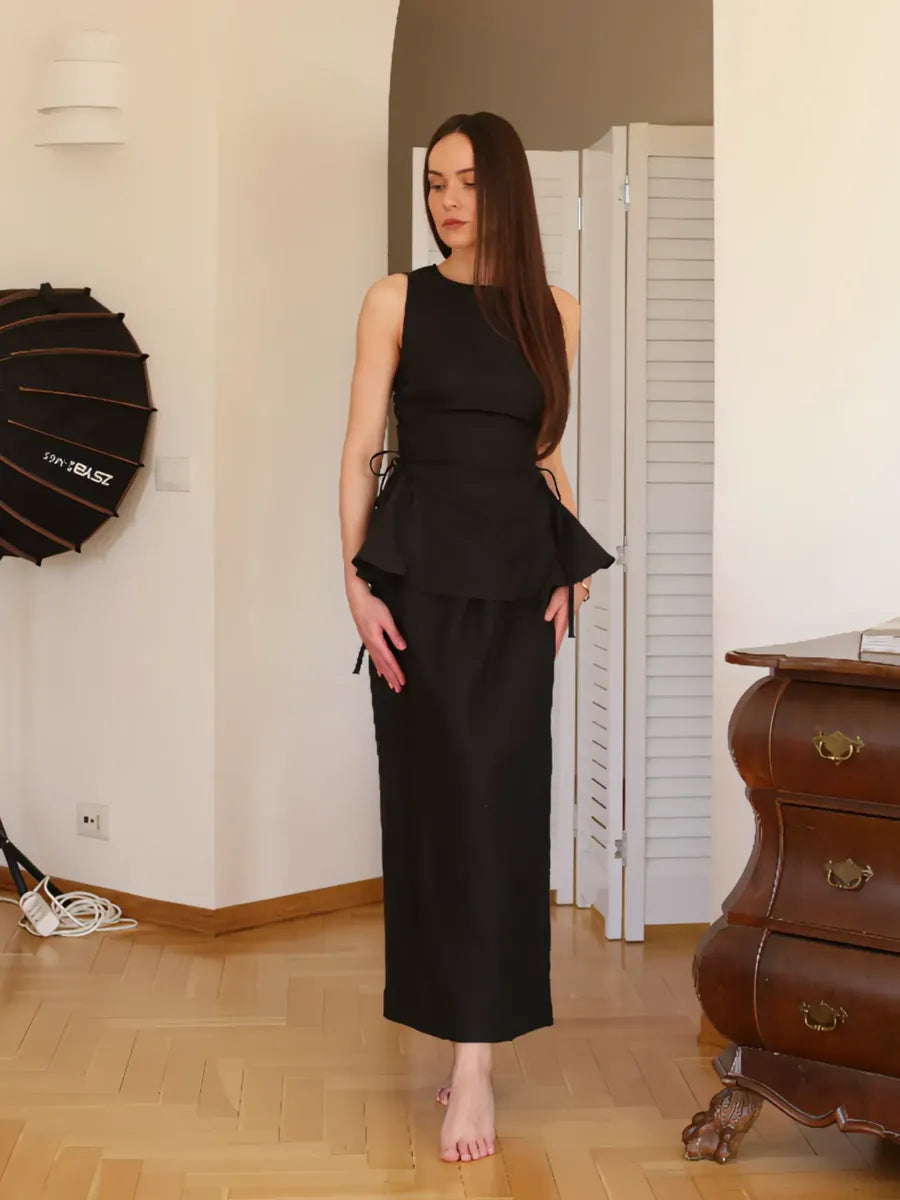 Black Swan Co-ord by Lincoln Paris featuring a stylish black matching top and pants set on a flat lay.