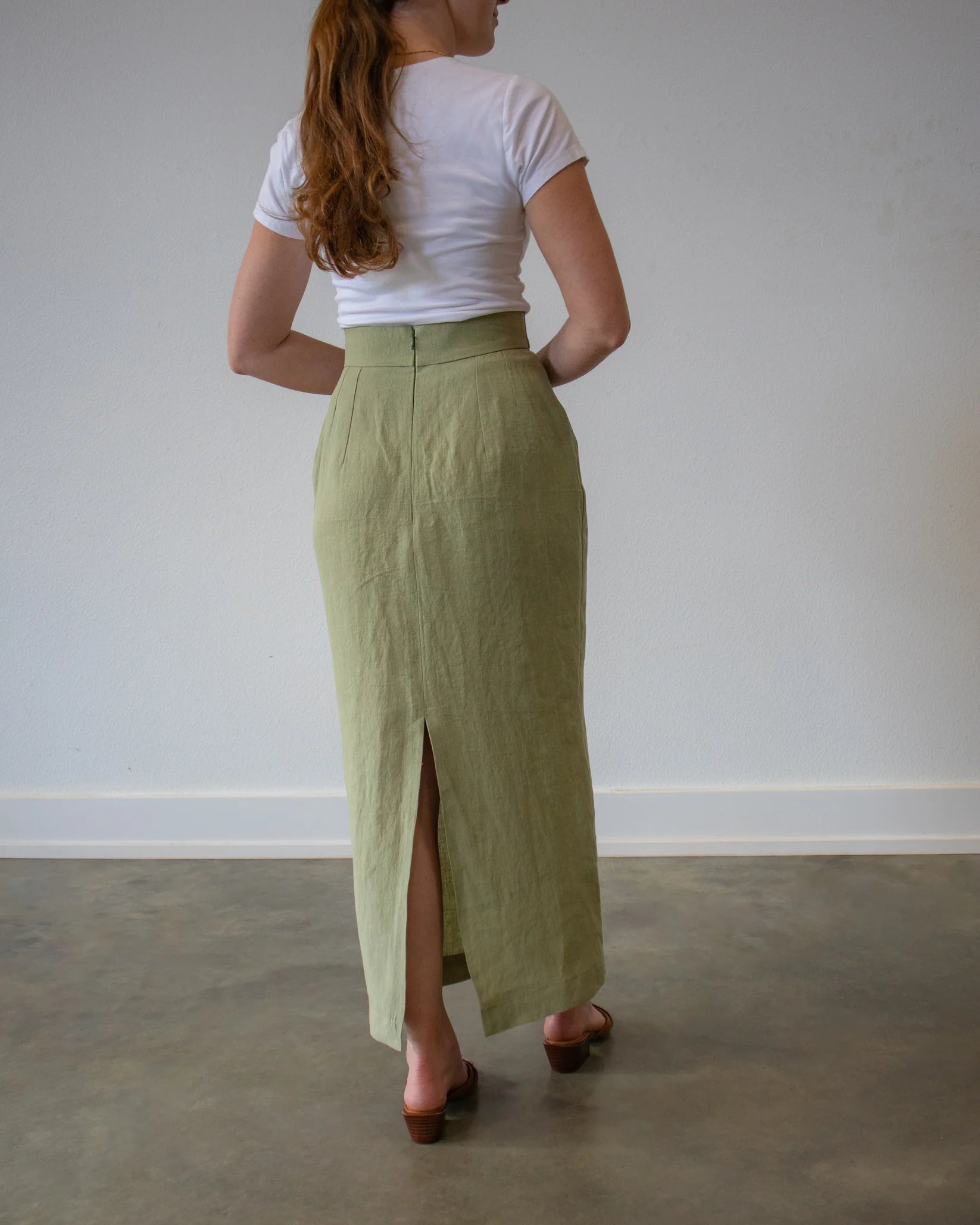Lincoln Paris Linen Muse Skirt displayed on a model, showcasing its flowy fabric and stylish design.