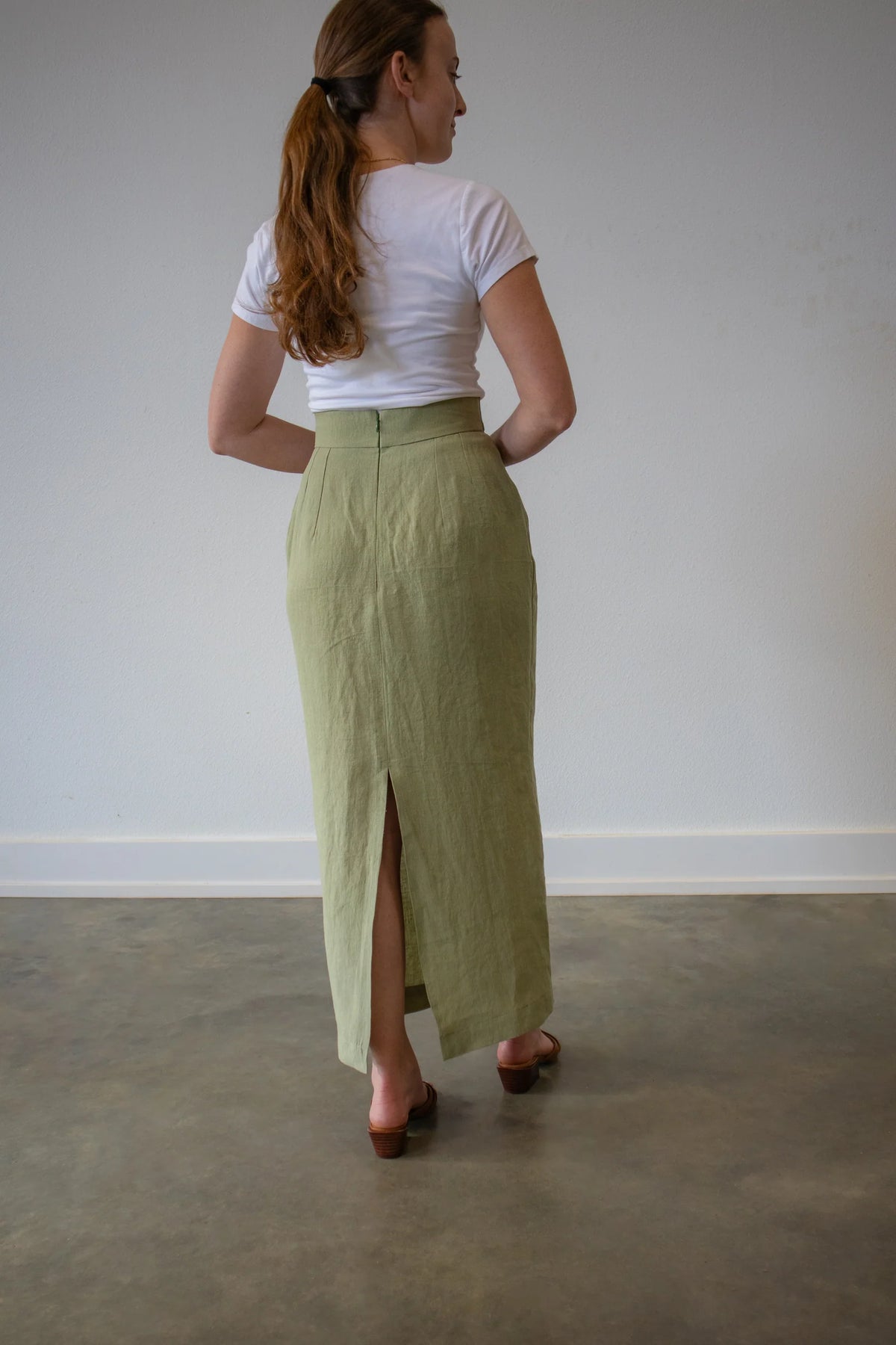 Lincoln Paris Linen Muse Skirt displayed on a model, showcasing its flowy fabric and stylish design.