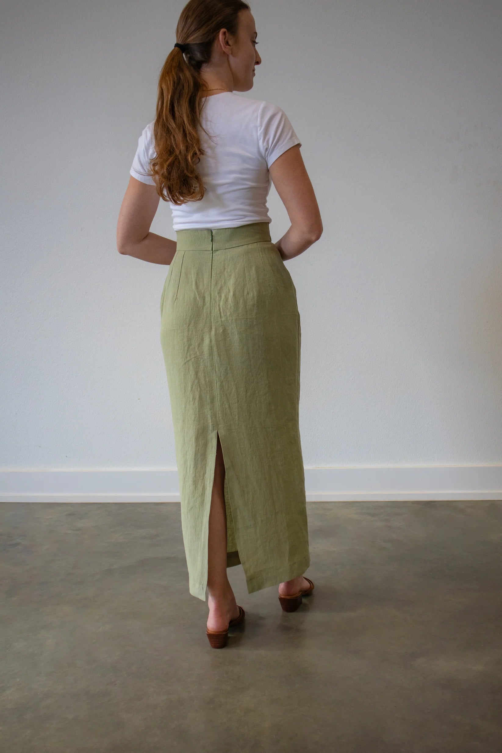 Lincoln Paris Linen Muse Skirt displayed on a model, showcasing its flowy fabric and stylish design.
