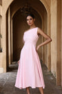 Lincoln Paris Rosewood cotton linen dress, lightweight and flowy with a relaxed fit, shown in a natural outdoor setting.