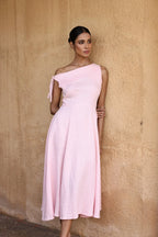 Lincoln Paris Rosewood cotton linen dress displayed on a hanger, featuring a relaxed fit and natural fabric texture.