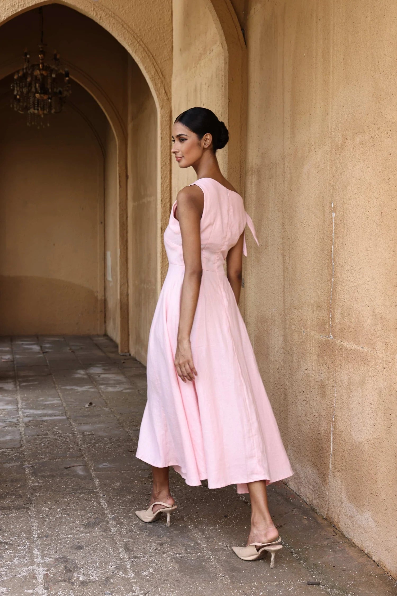 Lincoln Paris Rosewood cotton linen dress displayed on a hanger, featuring a lightweight, flowy design perfect for casual wear.