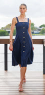 Seaborne cotton linen dress by Lincoln Paris displayed on a hanger, showcasing its lightweight fabric and relaxed fit.