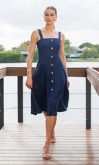 Seaborne cotton linen dress by Lincoln Paris displayed on a hanger, showcasing its lightweight fabric and relaxed fit.