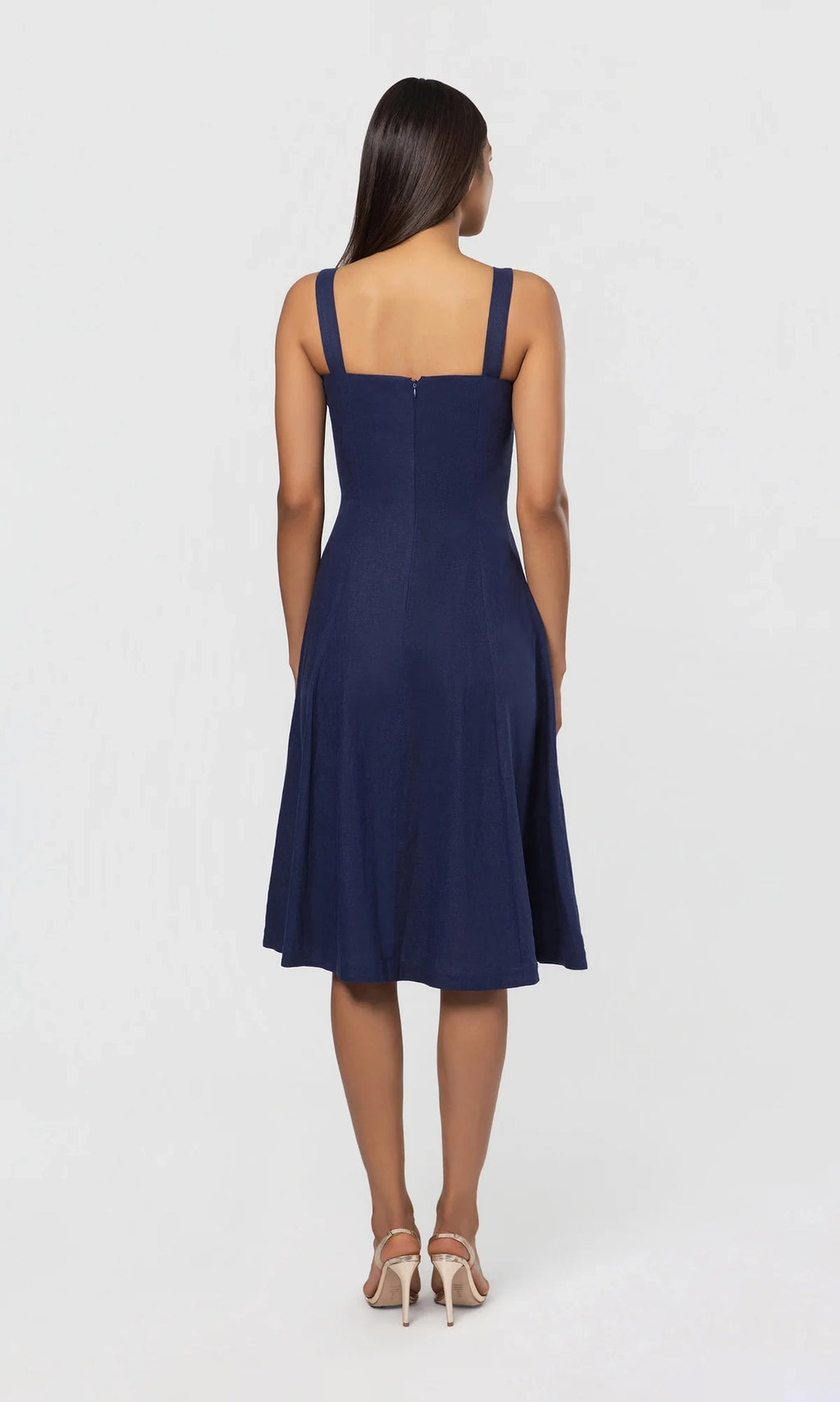 Seaborne cotton linen dress by Lincoln Paris displayed on a hanger, showcasing its lightweight, breathable fabric and relaxed fit.