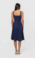 Seaborne cotton linen dress by Lincoln Paris displayed on a hanger, showcasing its lightweight, breathable fabric and relaxed fit.
