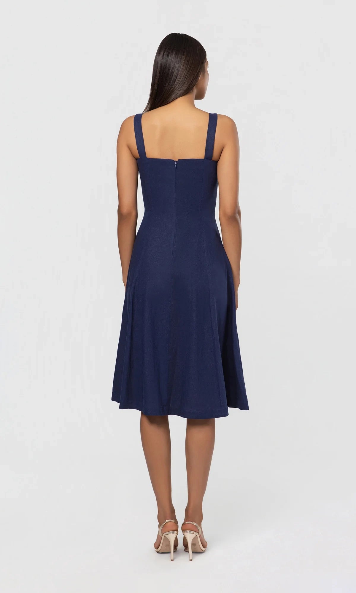 Seaborne cotton linen dress by Lincoln Paris displayed on a hanger, showcasing its lightweight, breathable fabric and relaxed fit.