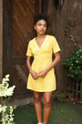 Lincoln Paris DaisyDay cotton linen dress displayed on a hanger with a lightweight, breathable fabric and floral design.