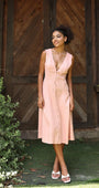 Lincoln Paris Roselle cotton linen dress displayed on a hanger, showcasing its lightweight fabric and relaxed fit.