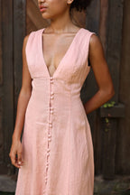 Lincoln Paris Roselle cotton linen dress featuring a flowing silhouette and subtle floral pattern, perfect for casual summer wear.