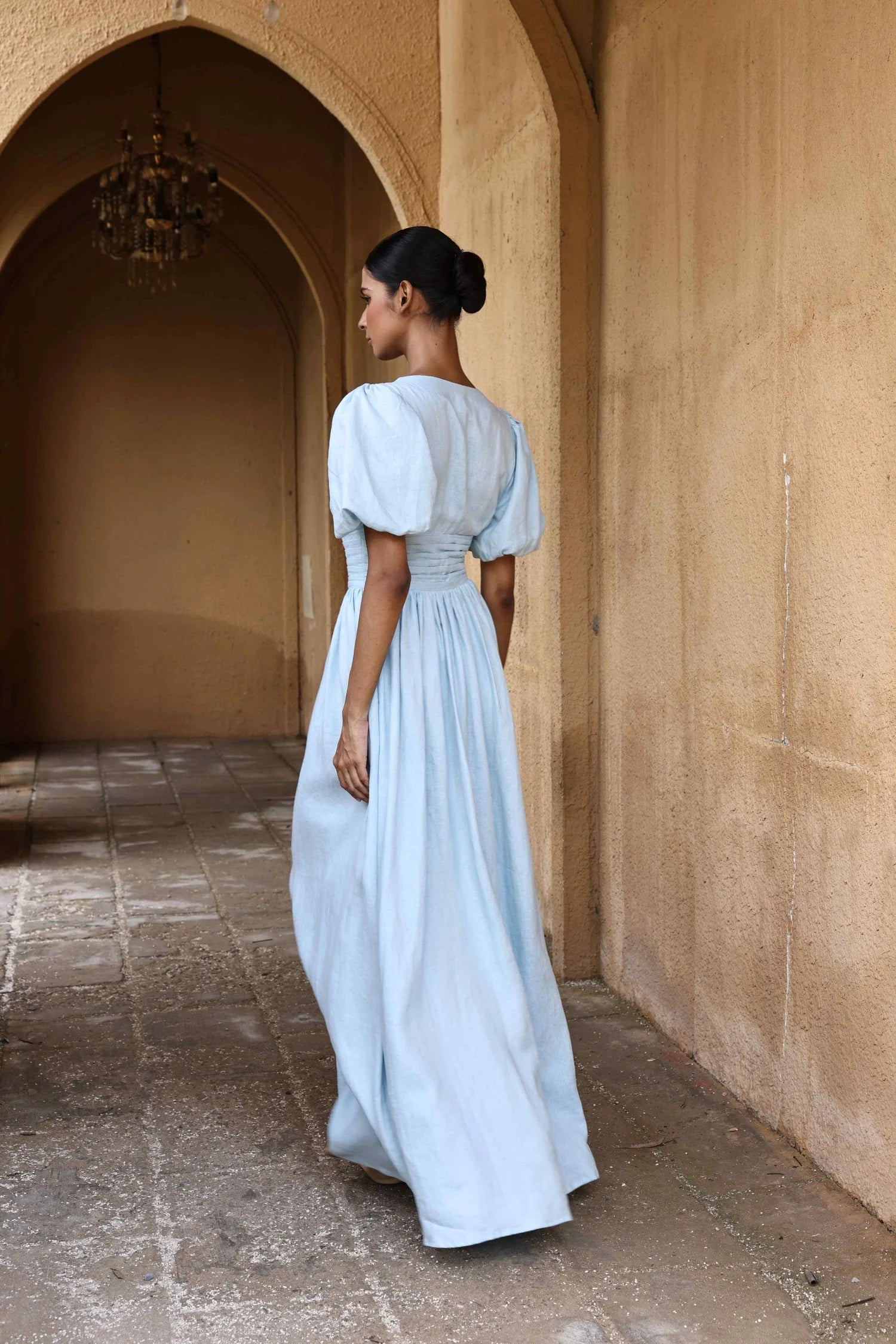 European cotton linen dress by Lincoln Paris, lightweight and airy with a relaxed fit, shown on a hanger against a neutral background.