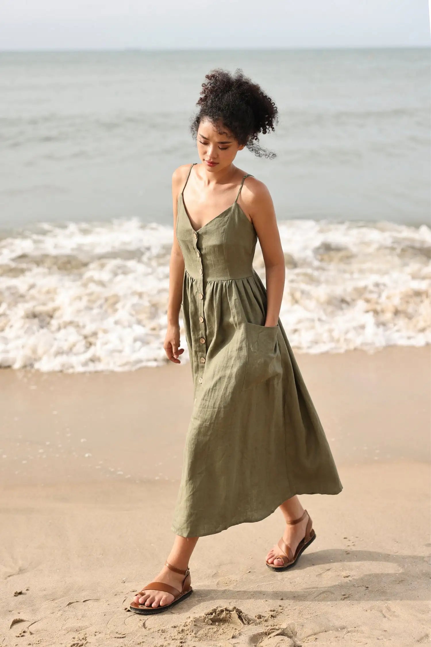 Lincoln Paris cami cotton linen dress featuring a relaxed fit, lightweight fabric, and adjustable straps, displayed on a hanger.