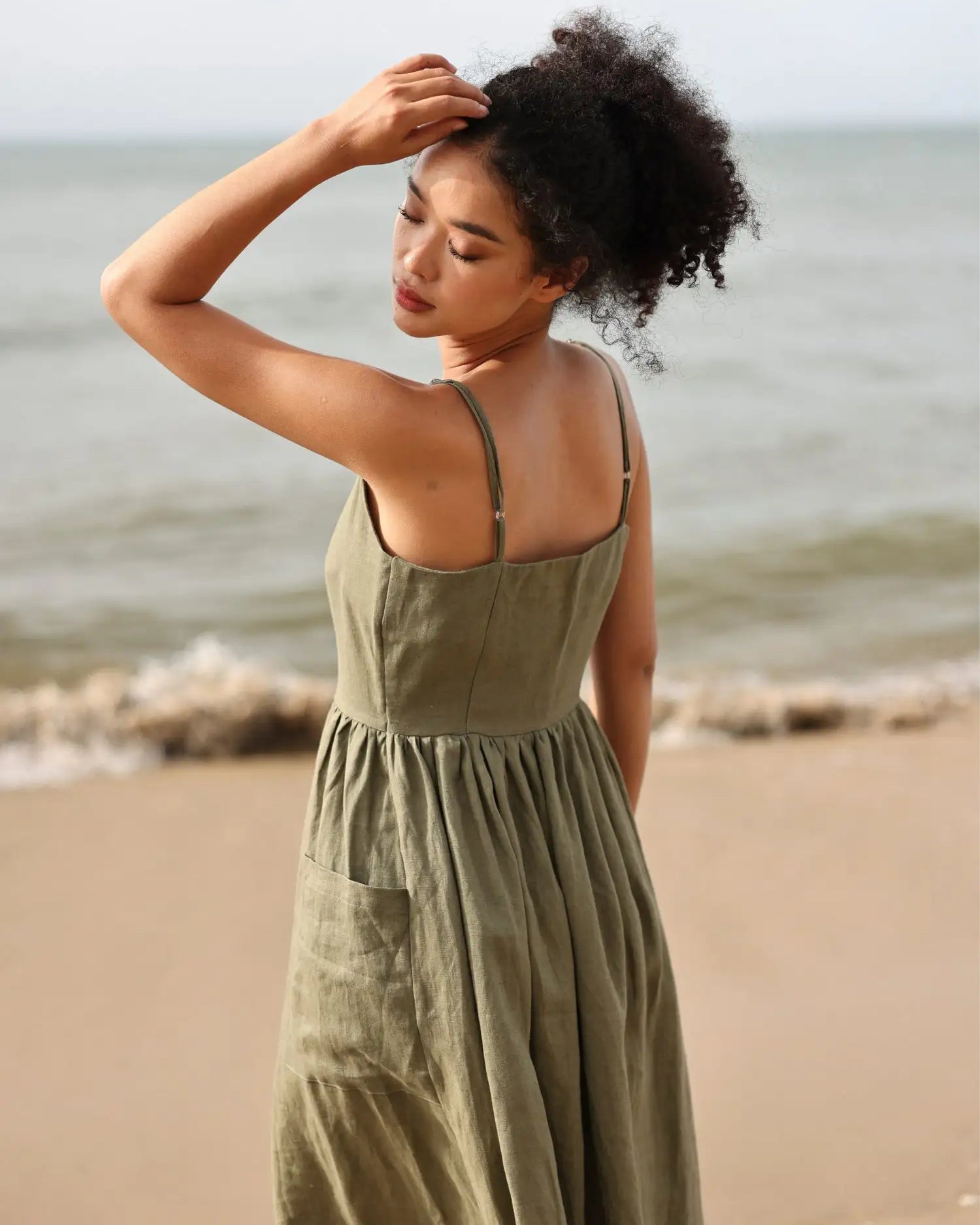 Lincoln Paris cami cotton linen dress hanging on a hanger, showcasing lightweight, breathable fabric and casual summer style.