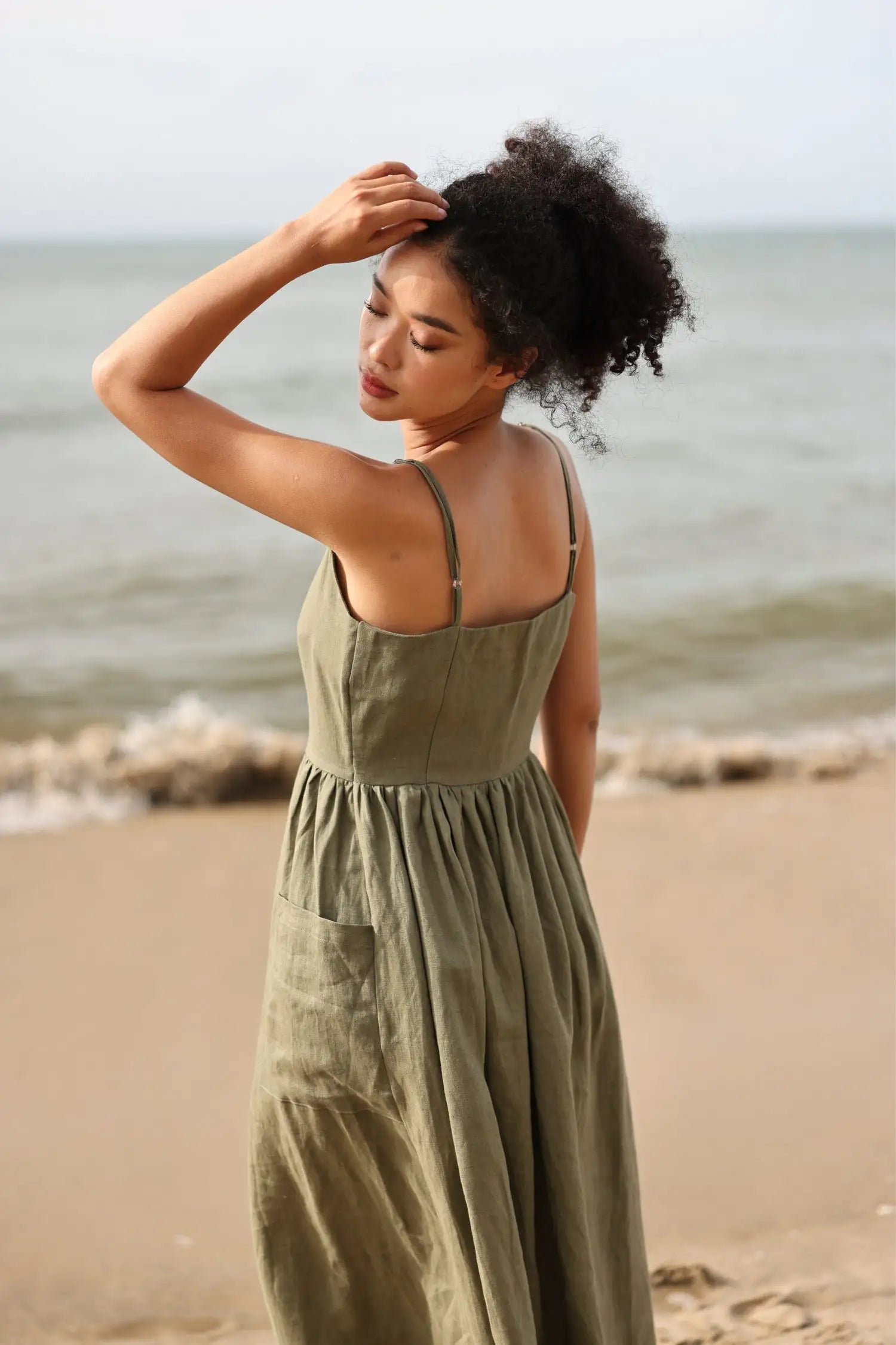 Lincoln Paris cami cotton linen dress hanging on a hanger, showcasing lightweight, breathable fabric and casual summer style.