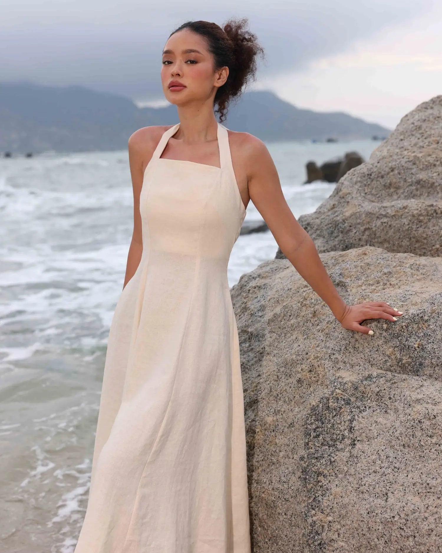 Lincoln Paris Cloud 9 cotton linen dress displayed on a hanger, featuring a relaxed fit and lightweight fabric for casual wear.