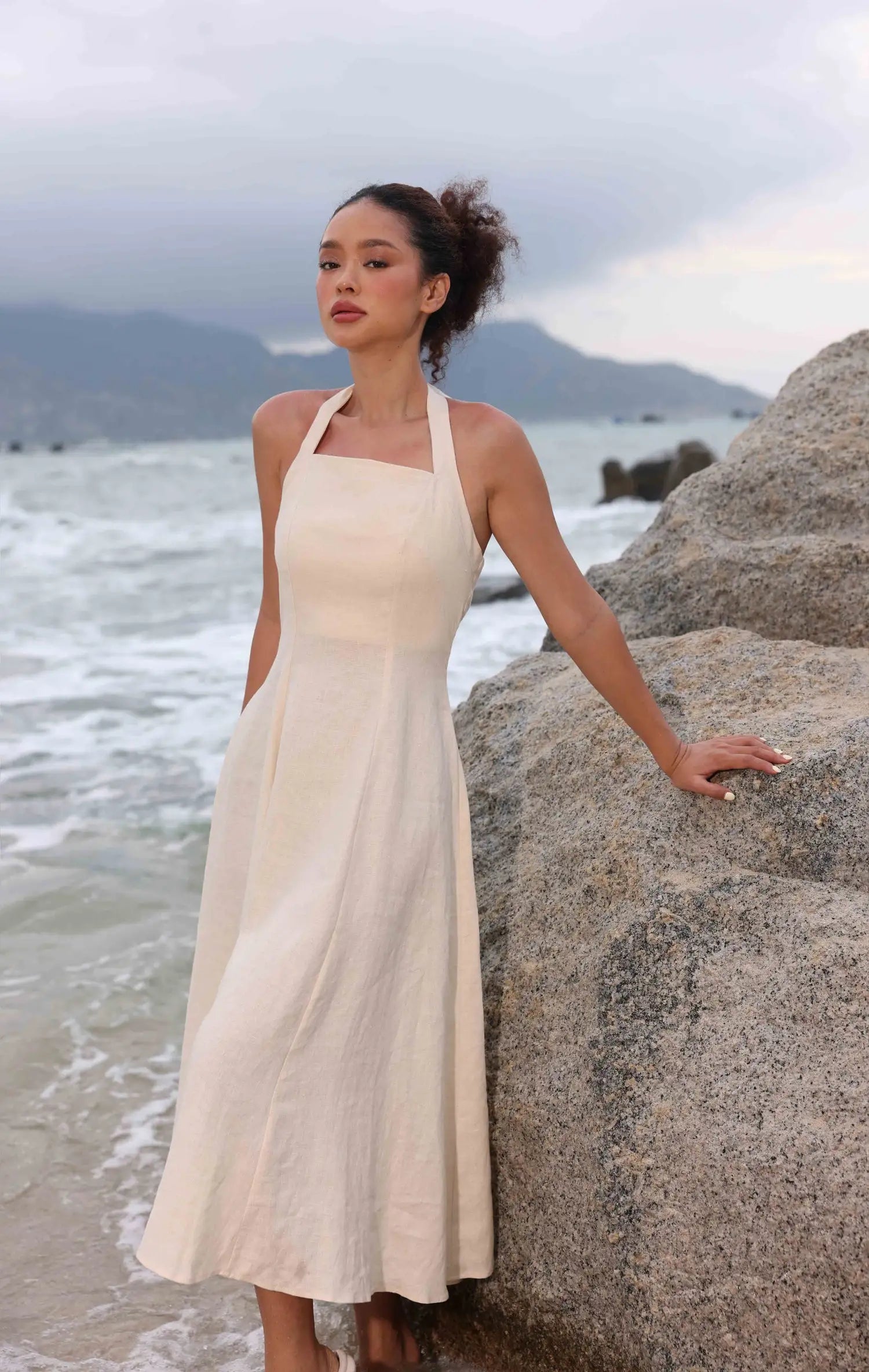 Lincoln Paris Cloud 9 cotton linen dress displayed on a hanger, featuring a relaxed fit and lightweight fabric for casual wear.