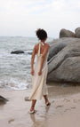 Lincoln Paris Cloud 9 Cotton Linen Dress hanging on a wooden hanger, showcasing lightweight, breathable fabric and relaxed fit.