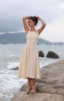 Lincoln Paris Cloud 9 cotton linen dress displayed on a hanger, showcasing its lightweight fabric and relaxed fit.
