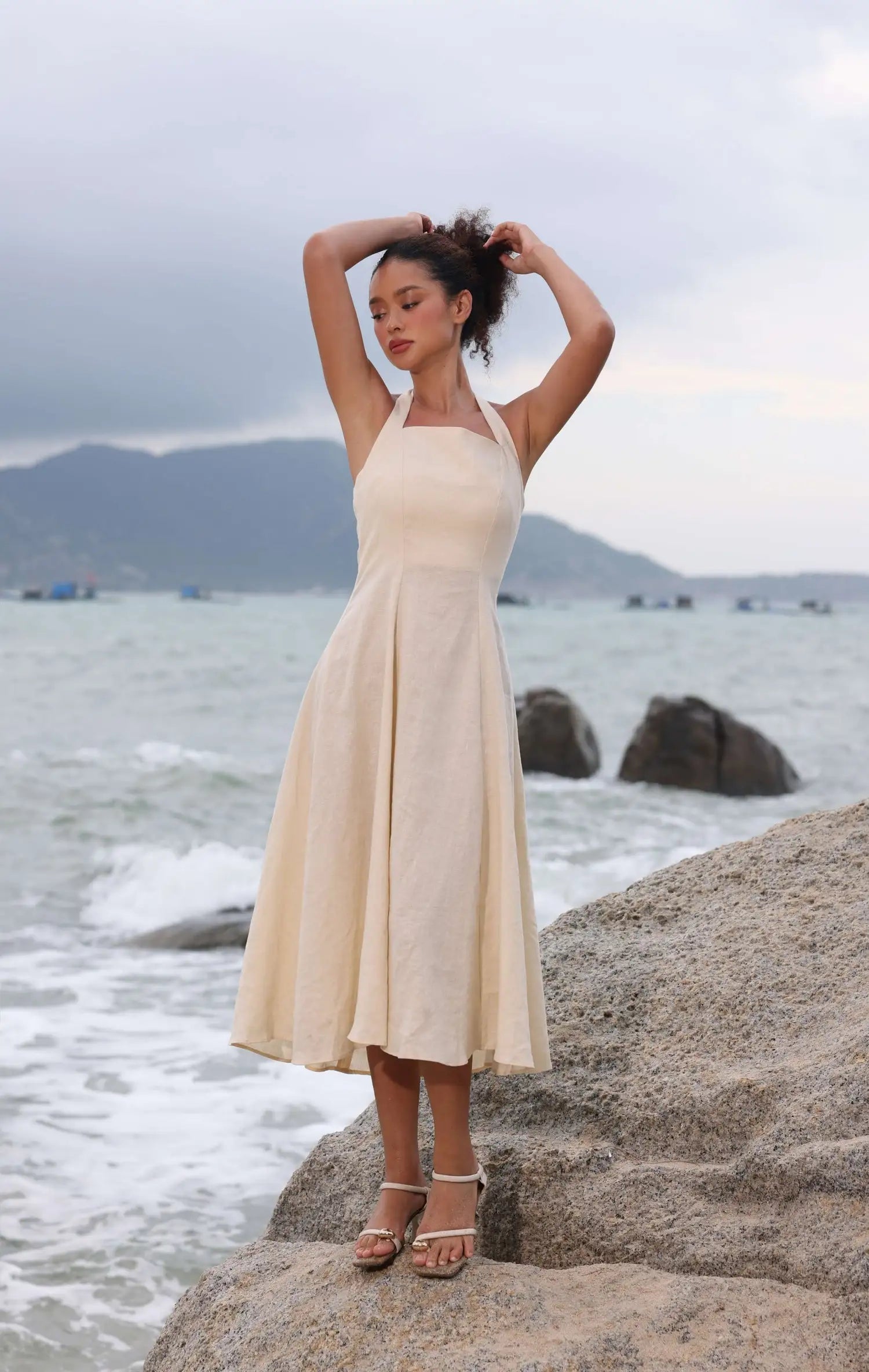 Lincoln Paris Cloud 9 cotton linen dress displayed on a hanger, showcasing its lightweight fabric and relaxed fit.
