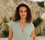 Lincoln Paris Mintleaf cotton linen jumpsuit displayed on a hanger with a relaxed fit and natural fabric texture.
