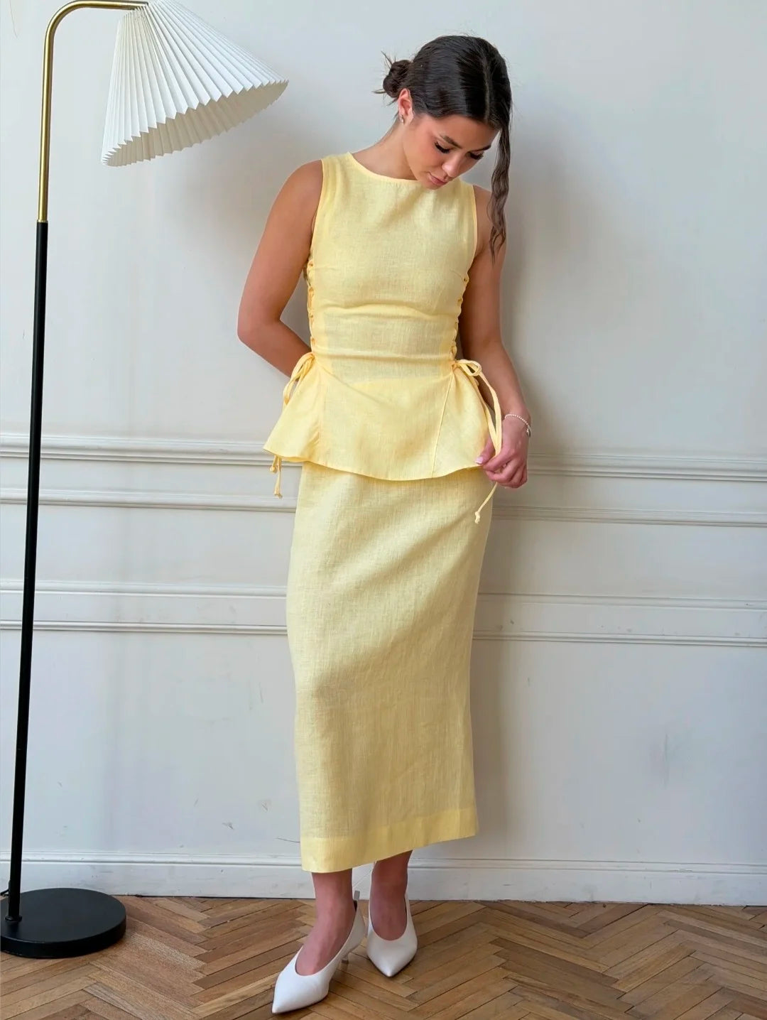 Lincoln Paris Buttercup Co-ord set featuring a matching top and skirt in soft buttercup yellow fabric.