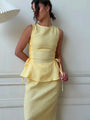 Lincoln Paris Buttercup Co-ord set featuring a stylish matching top and pants in a vibrant, trendy design.