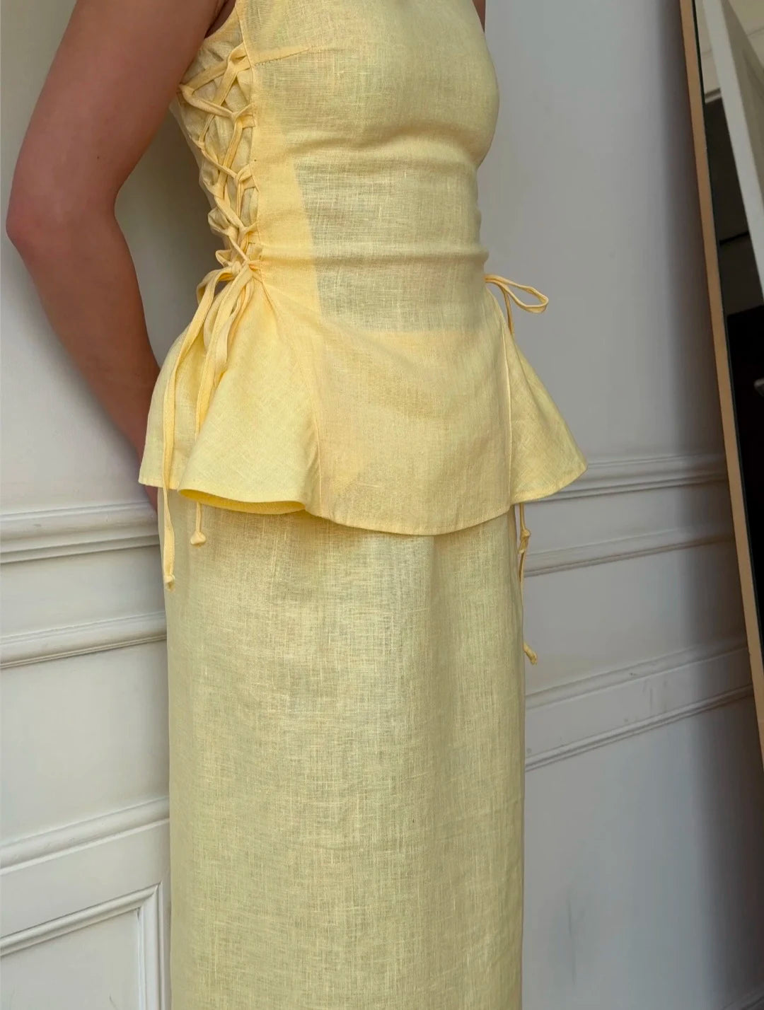 Lincoln Paris Buttercup Co-ord set featuring a matching top and skirt with floral pattern and lightweight fabric.