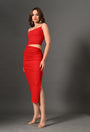 Woman in a stylish red ruched bodycon two-piece dress with spaghetti straps